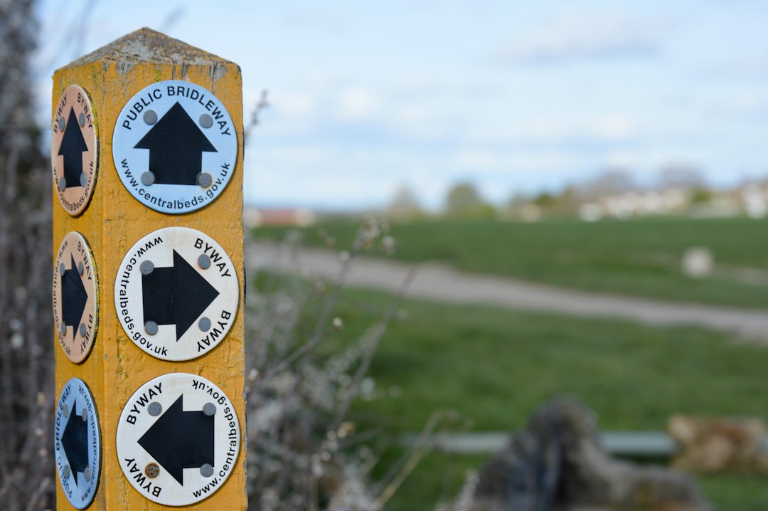 Directional signpost on a countryside walking route; illustrative image, not a verified Isle of Wight location.